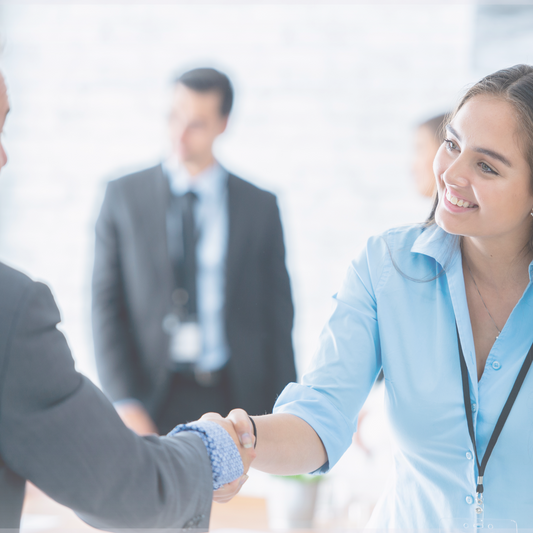 Two people shaking hands. 