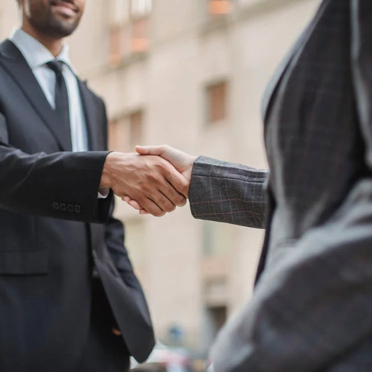 Two businessmen shaking hands 
